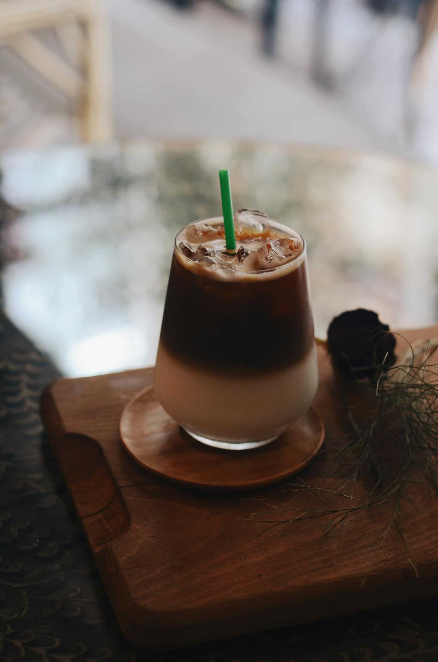 Filled Clear Rock Glass With Green Straw